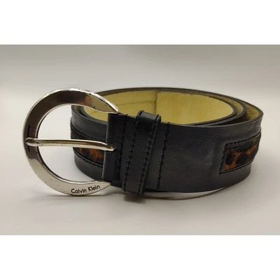 Cinturón de Colección Calvin Klein Mujer Cuero Negro Estampado de Guepardo Hebilla Plateada Grande Foto 1 de 4