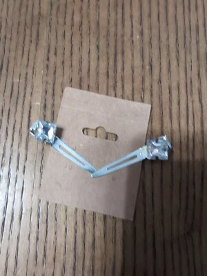 Pinza para el cabello Barnetts con forma de diamante facetado tono plata 28Ps Foto 1 de 3