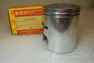 12110-33004-100  SUZUKI OEM 1.0 OVER PISTON 72-77 GT380 SEBRING GT250 HUSTLER - Picture 1 of 8