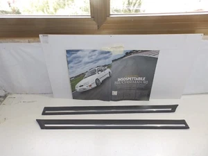 FORD FIESTA 4 P DEL 89 - MODANATURE PARAFANGO POSTERIORE DX E SX PZ 02 - Picture 1 of 3