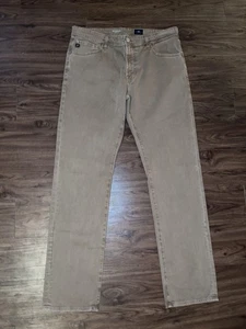 Pantalones de mezclilla AG Adriano Goldschmied para hombre 36R beige The Graduate pierna a medida elásticos - Imagen 1 de 8