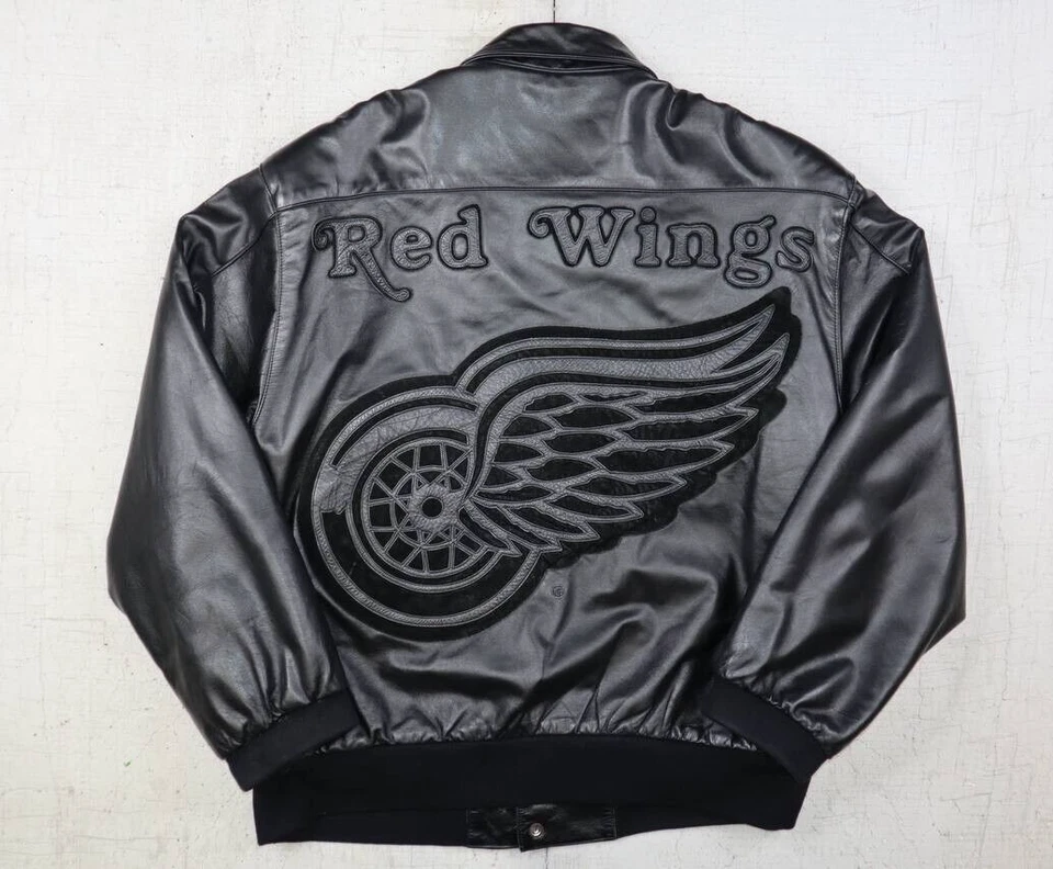 Jaqueta de couro vintage 1995 Detroit Red Wings toda preta design JH tamanho grande - Imagem 1 de 4
