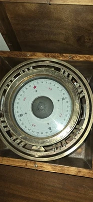 Vintage gimballed ship's brass compass with red star and asian characters. - Image 1 of 4