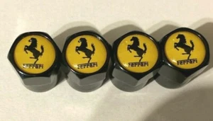 FERRARI COMPATIBLE BLACK DUST CAPS WITH YELLOW BADGE,SET OF 4 FREE 1stCLASS POST - Picture 1 of 1