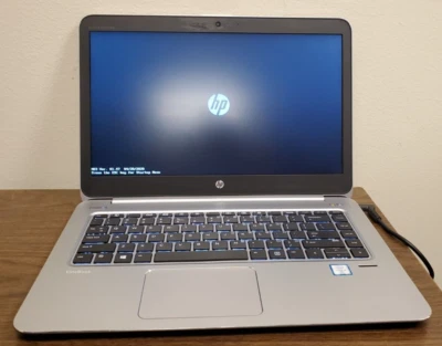 Portátil HP EliteBook Folio 1040 G3 con adaptador de corriente Foto 1 de 4