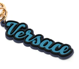 Versace Unisex Key Ring Gold Round Blue Silicone Charm Logo Key Chain NWT $225 - Picture 1 of 10