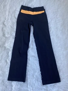 LULULEMON ASTRO HOSE SCHWARZ CREMEFARBENER BUND YOGA TANZ FITNESS PILATES Gr. 4 - Bild 1 von 9