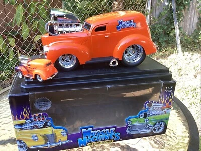 Muscle Machines 1/18 Scale Diecast Car 71169 1940 Sedan Delivery Orange W/Mini - Image 1 of 4