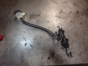 KAWASAKI NINJA 400 / 500 / Z400 OEM REAR MASTER CYLINDER P/N 43015-0667 - Picture 1 of 2