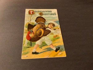 Thanksgiving Greetings ~ Beautiful Boy Carrying Turkey - Embossed Ant. Postcard - Picture 1 of 2