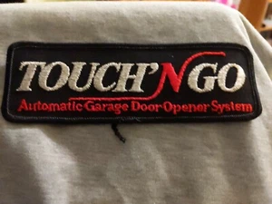 Werbung Garagentor "Touch N Go" 6 x 2 Zoll - Bild 1 von 3