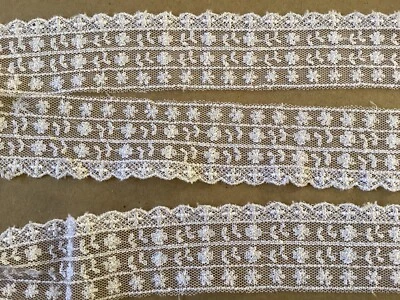 9 1/2 YDS SCALLOPED WHITE FLORAL RAYON EMBROIDERED ON POLY NET - Image 1 of 4