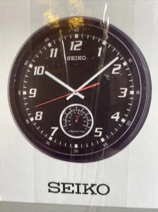 Seiko 13.5" Wall Clock With A Thermometer Dial Above 6 QXA696KLH - Picture 1 of 3