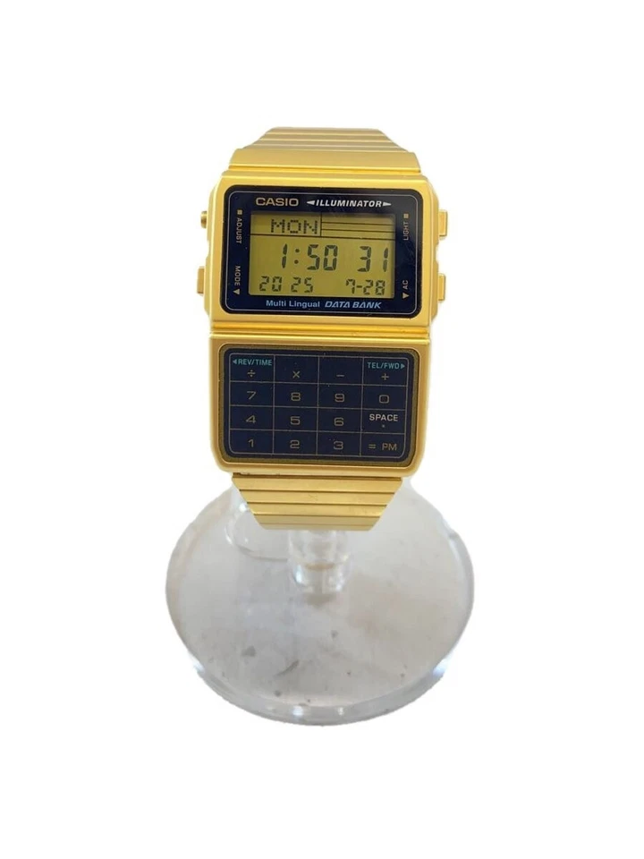 CASIO DBC 611G databank quartz wristwatch digital stainless BLK GLD - Image 1 of 4