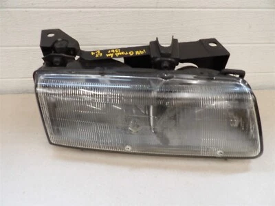 PONTIAC GRAND AM 1989-1991 RH PASSENGER SIDE HEADLIGHT W/ MOUNTING BRACKET OEM - Image 1 of 4