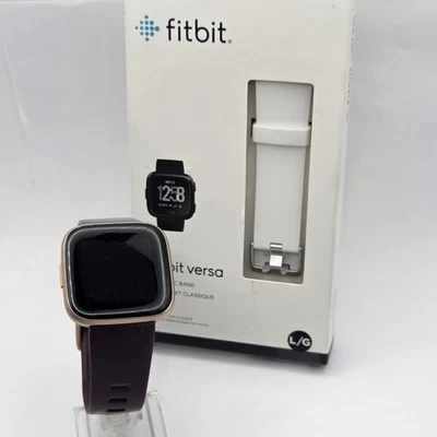 Reloj Inteligente Fitbit Versa 2 - Estuche Rosa Cobre Banda Púrpura Plus Nueva Banda FB Blanca Foto 1 de 4