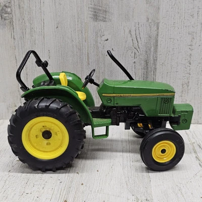 Tractor John Deere 5400 ERTL 1995 con cuerdas, escala 1/16 Foto 1 de 4