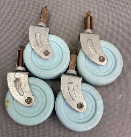 4 vintage plastic furniture casters - 1.5” pin & 2.75" diameter blue  wheels Cover