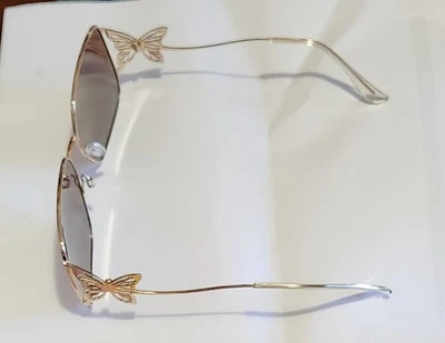 Gafas de sol polarizadas Butterfly con lentes UV400, estuche y accesorios - tono dorado Foto 1 de 4