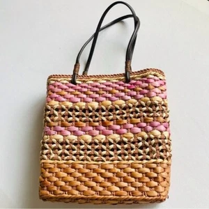Borsa a mano a righe in paglia intrecciata - Foto 1 di 11