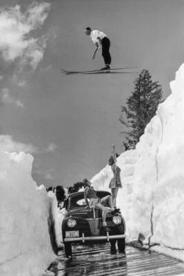Vintage Ski Jump Over Car and Girls Photo Poster, Road Gap Skier Jumps Girls Car - Image 1 of 2