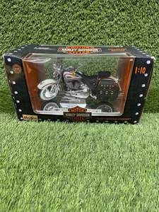 BICICLETA MAISTO HARLEY-DAVIDSON MODELO A ESCALA 1:10 FLSTS Heritage Springer 31605 sin usar, en caja  - Imagen 1 de 4