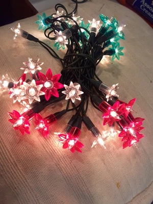 VINTAGE CHRISTMAS LIGHTS.  RED, GREEN & CLEAR PRISMATIC STARS/FLOWERS.   WORKING - Image 1 of 4