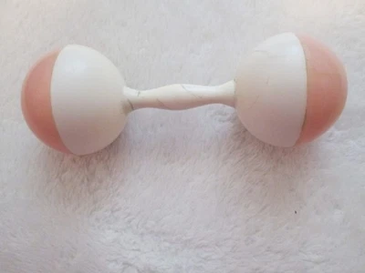 Antiguo sonajero de plástico con barra rosa y blanco de los años 50 - coleccionable - 4" x 1,25" Foto 1 de 4