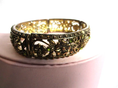 Brass Filgree Stretch Cuff Bracelet Bronse  w Faux Peridot Green Stones - Image 1 of 4