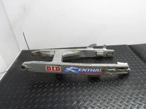 01-13 KAWASAKI KX 100 KX100 OEM BASCULANTE TRASERO BRAZO DE SUSPENSIÓN 33001-1543-TX - Imagen 1 de 20