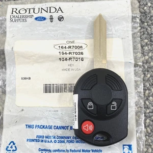 OEM Ford Key Fob 3-Button Remote OUCD6000022 w/ Uncut Blade 164-R7006 / 26 / 16 - Picture 1 of 6