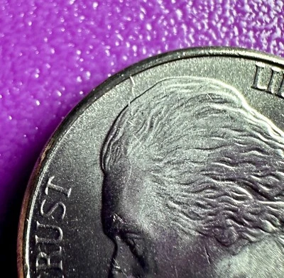 2004 D 5c Handshake Uncirculated Die Crack Error  from Rim to Hairline  (1M) - Image 1 of 3