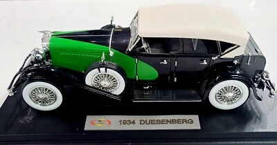 Vintage 1934 Duesenberg 1/18 scale Black / Green Diecast car by Signature Models - Image 1 of 4