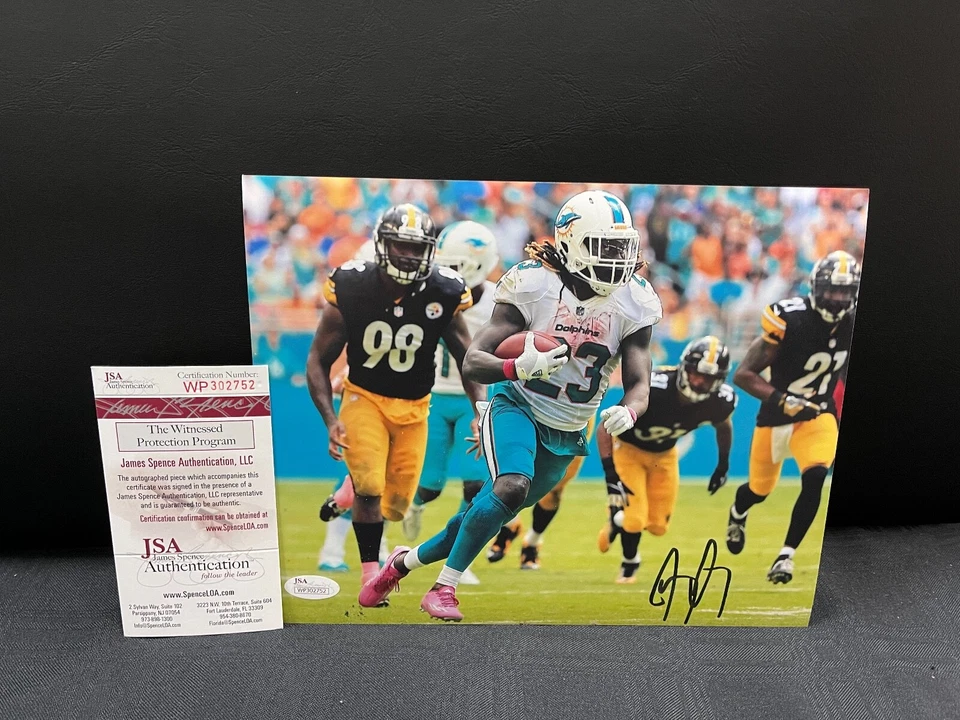 JAY AJAYI MIAMI DOLPHINS SIGNED 8X10 PHOTO W/ JSA WTNESS COA - Image 1 of 1