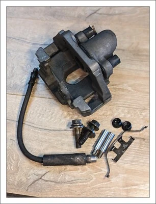 ✅ Pinza de freno trasera izquierda BMW 750i 2007 OEM  Foto 1 de 4