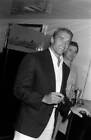 Actor Arnold Schwarzenegger & guest attend party celebrating Mich- Old Photo 6