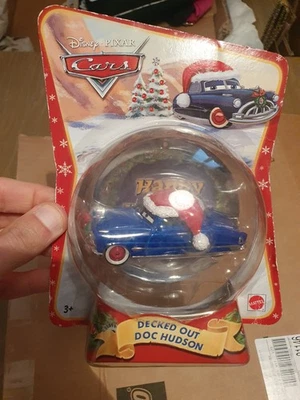 2011 modellino Disney Pixar Cars DECKED OUT DOC HUDSON Natalizio nuovo mattel - Immagine 1 di 2