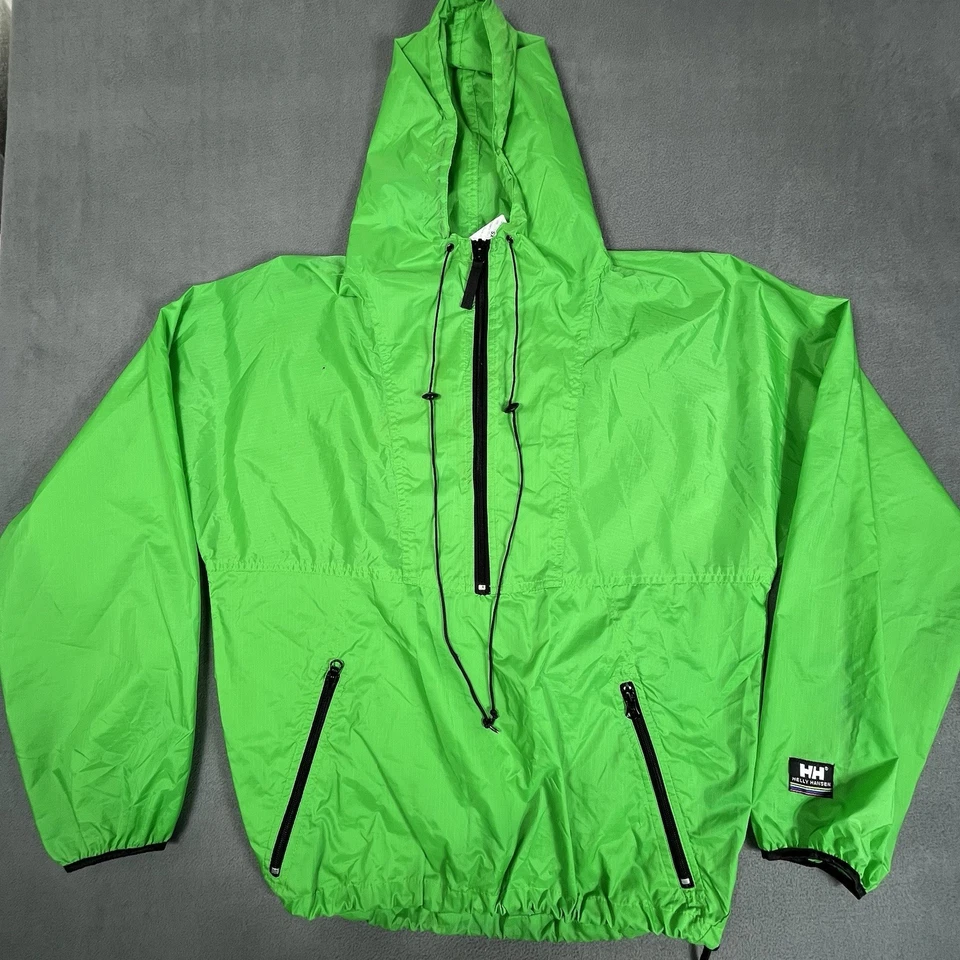 Chaqueta cortavientos Helly Hansen adulto XS verde empaquetable tecnología de lluvia con capucha Foto 1 de 4