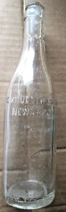 BWG G. KRUEGER VINTAGE. Co. NEWARK, N.J. CERVEZA CORONA TRANSPARENTE EN RELIEVE SUPERIOR, USADA - Imagen 1 de 5