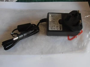 WA-24E12 AC Adaptor  UK Plug 100-240V 0.65A to 12V 2A ( 5.5 - 2.0 / 2.1 mm ) APD - Picture 1 of 3