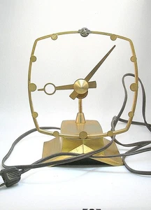 JEFFERSON "GOLDEN SECRET" MCM ELECTRIC MYSTERY CLOCK 7 1/2" TALL - WORKING ORDER - Picture 1 of 8