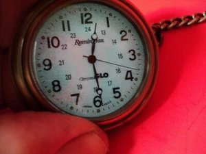 REMINGTON (FUNCIONAMIENTO) CROMO - BRILLO/TONO BRONCE/CARA ABIERTA CON CADENA HD - Imagen 1 de 7