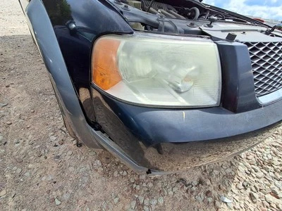 Conjunto de faros derechos usados se adapta a: Ford Freestyle 2005 grado derecho A Foto 1 de 4