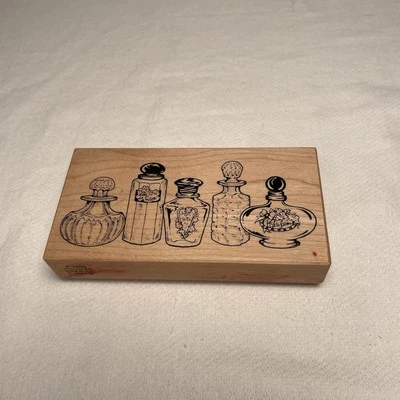 Botellas de perfume de boticario vintage sello de goma montado en madera álbum de recortes artesanales Foto 1 de 4