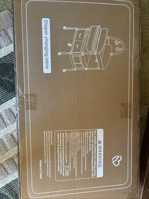 Cambiador nunca abierto nuevo Foto 1 de 4