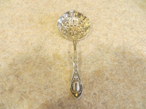 Sterling Silver Serving Spoon. 4-3/4" Cover