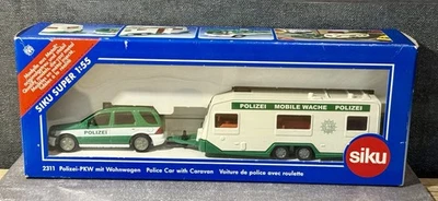 Siku Super 1:55, 2311, Polizei-PKW mit Wohnwagen, Modellfahrzeug mit OVP - Bild 1 von 4