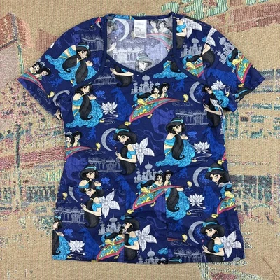 Disney Aladdin Magic Carpet Jasmine Navy Blue Scrub Top Shirt Size XS - Image 1 of 4