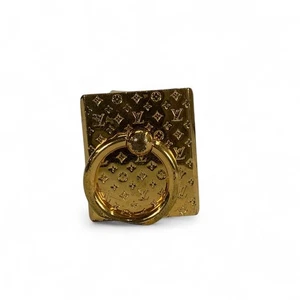 Bague bunker téléphone support nanogramme LOUIS VUITTON or M64868 LV authentique - Photo 1 sur 7