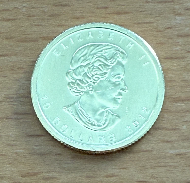 Canada 2012 Gold 1/4 oz $10 Maple Leaf UNC with minor hairlines - Image 1 of 2